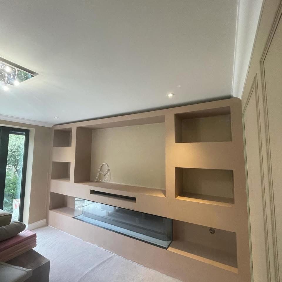 BL Plastering custom media wall and fireplace project